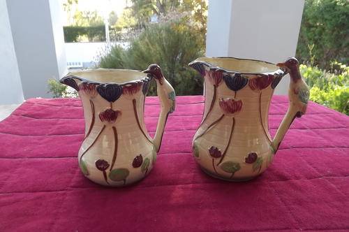 Set of 2 porcelain jugs from the 1940's.From England.Large jug height 13 cm smaller jug 12.5 cm.