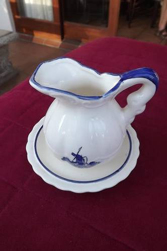 White porcelain jug with blue dutch windmill design,for cream with matching spill saucer.New condit