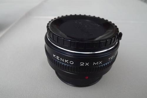 Kenko 2x Mx Teleplus MC4 lens in new condition with lens covers and storer.