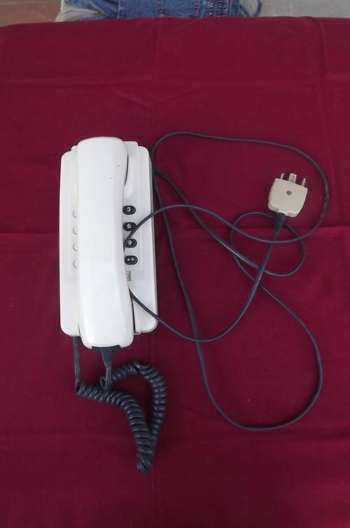Beige colour push button telephone.Good exterior condition