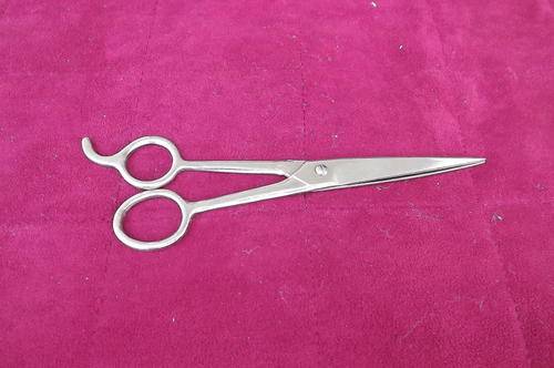 Hairdressers steel scissors made in USA. Length 16.5 cm. Good condition