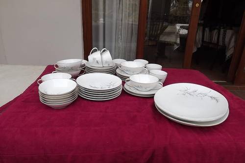 Thomas Germany Porcelain Dinner set.38 Pieces.Gilded edging.Consist of 2 oval serving plates,6 small
