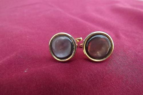 Stylish pair of round cufflinks with stone fronts.As new