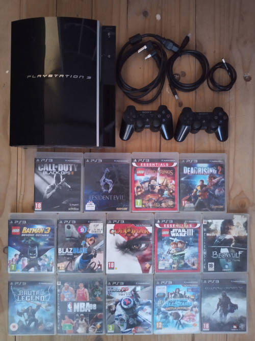 Playstation 3 + 2 controllers and 12 games