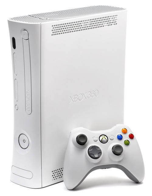 Xbox 360 with 2 remotes and 5 games