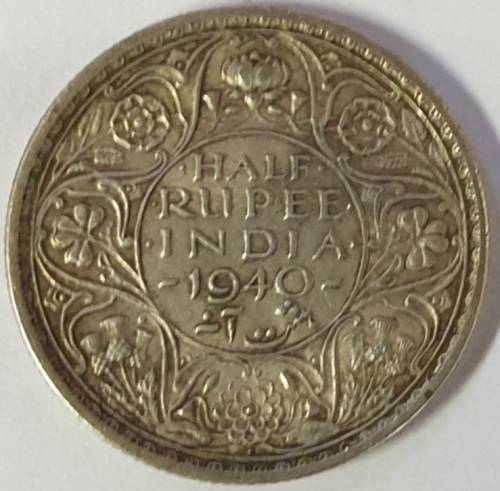 INDIA SILVER HALF RUPEE 1940 AS PER PICS NO RESERVE AUCTION