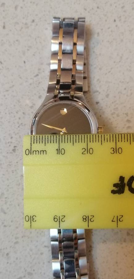 ### Swiss perfection Movado Ladies watch, box, pamphlets and 4 extra links, working 100% ###