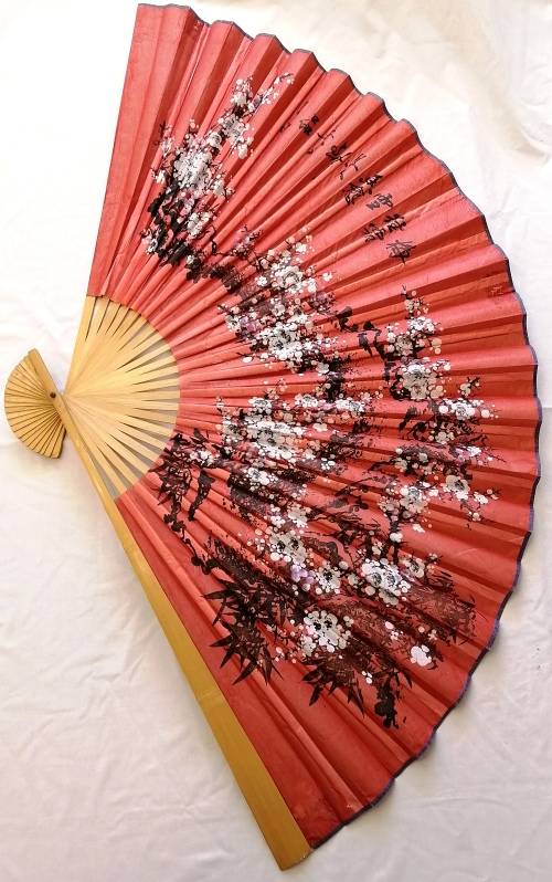 Extra Large, decorative, Chinese wall fan. Red with blooming cherry branch and Chinese characters.