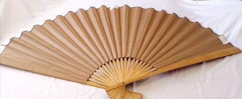 Extra Large, decorative, Chinese wall fan. Red with blooming cherry branch and Chinese characters.