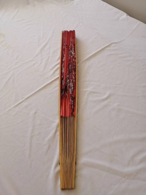 Extra Large, decorative, Chinese wall fan. Red with blooming cherry branch and Chinese characters.