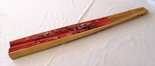 Extra Large, decorative, Chinese wall fan. Red with blooming cherry branch and Chinese characters.