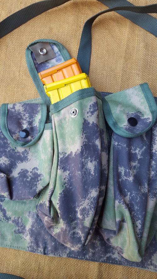on auction a new custom made Zim splotch camo in nylon chest webbing sized for 6 AK 47 or R4/5 mags