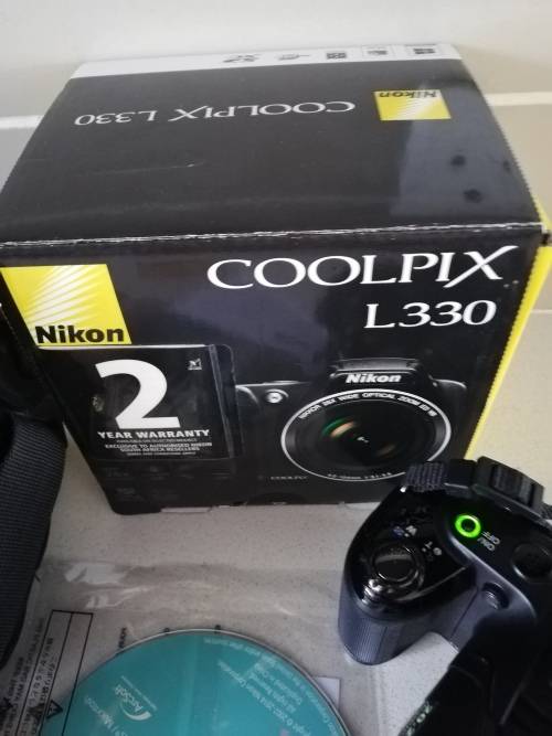 ***NIKON COOLPIX L330 , LIKE NEW, WITH ORIGINAL BOX, BAG, CHARGER,MEMORY CARD**