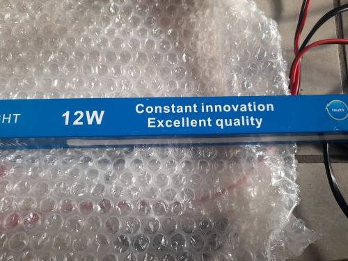 ***LOT OF OFF THE GRID SUPPLIES**2000W INVERTER(FAULTY), BATTERY CHARGER, NEW BATTERY, 12V LED LIGHT