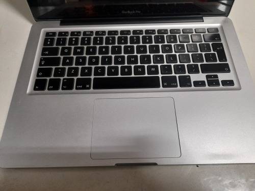 **MONTH END MADNESS*APPLE MAC BOOK PRO*NO CHARER NOT SURE SPECS*CRACKED SCREEN**