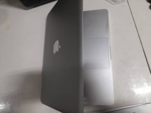 **MONTH END MADNESS*APPLE MAC BOOK PRO*NO CHARER NOT SURE SPECS*CRACKED SCREEN**
