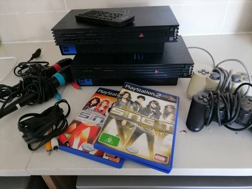 *MONTH END MAGIC*COMBO DEAL*2 X SONY PLAYSTATION 2 CONSOLS WITH REMOTE/CONTROL/GAMES/MICS ETC**