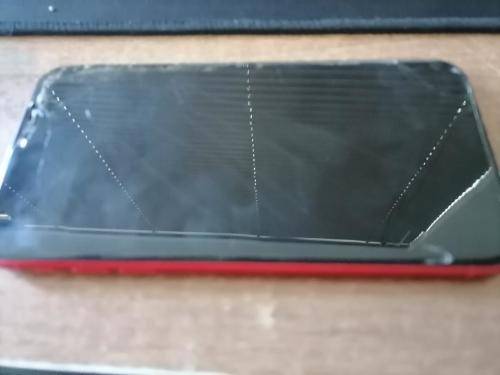 **APPLE IPHONE 11,RED IN COLOR*SCREEN IS CRACKED DOES NOT POWER ON**SOLD AS IS**