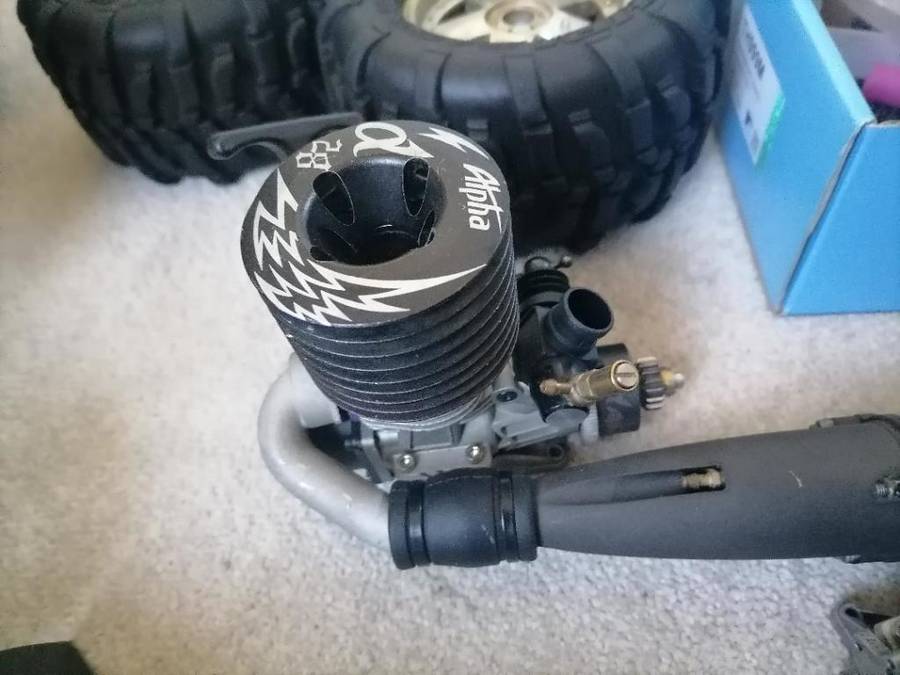 *AWESOME PROJECT*2 X HPI BIG SAVAGE NITRO TRUCKS WITH 2 MOTORS,MANY SPARES,NEW NUTS BOLTS,BEARINGS**