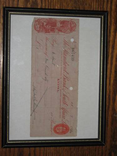 Framed Original STD bank cheque
