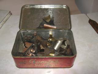 Old Tin With Picture Hooks