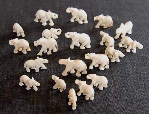 20 CARVED IVORY ELEPHANTS
