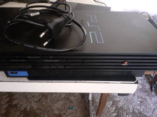 PS2 Console and power cabel.    ***Read Description***