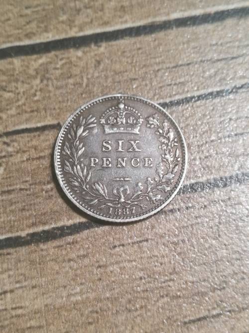 British six pence coin , 1887