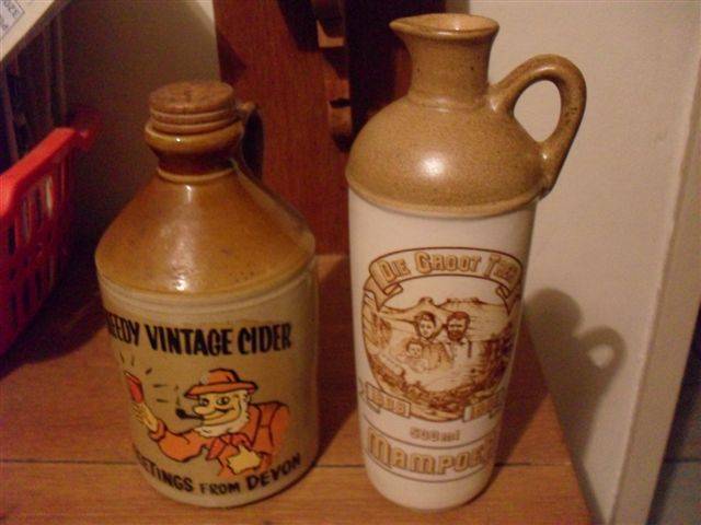 2 STONEWARE JARS....MAMPOER AND VINTAGE CIDER...(BOTH EMPTY )