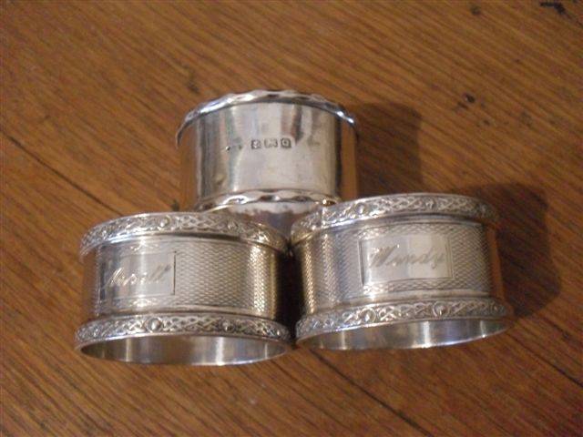 3 X HALLMARKED SILVER NAPKIN RINGS.....