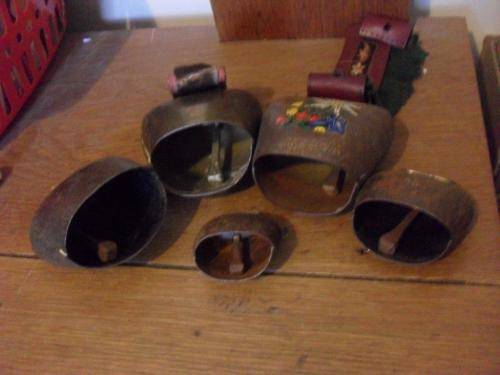 A COLLECTION OF COW BELLS