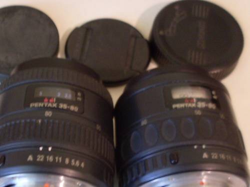 2 LENSES FOR PENTAX.....AND 3 LENS COVERS....