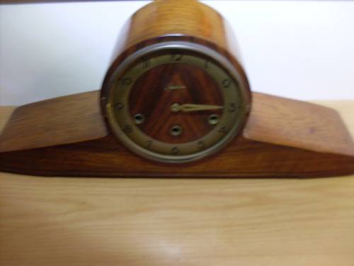 VINTAGE  WOODEN MANTLE CLOCK...MAUTHE MADE IN GERMANY...SEE PICS