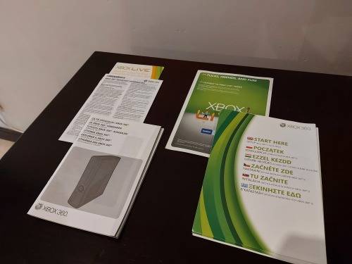Xbox 360 Slim 250 GB with 2 controllers