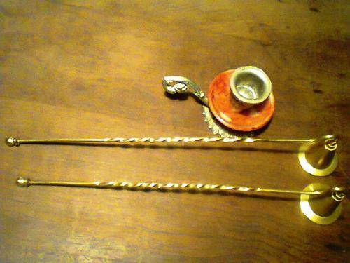 2 x Brass Candle Snuffers . 1 x S/Candle stick.
