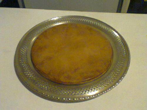 A Very Old EPNS Wood centered Bread or Cutting Board well used & in good condition