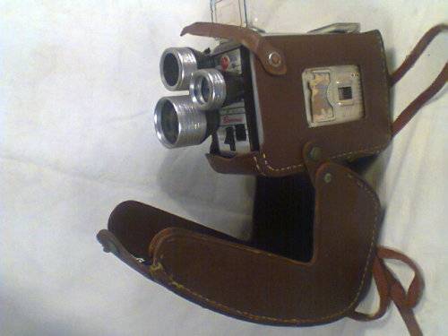 A VINTAGE Kodak Brownie Movie recording 3 Lens Camera with original Leather Case in 100% Condition.