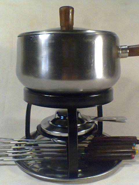 A Vintage old Fondue set complete with 6 forks & Tray All pieces marked L van Rensburg. Ready to use