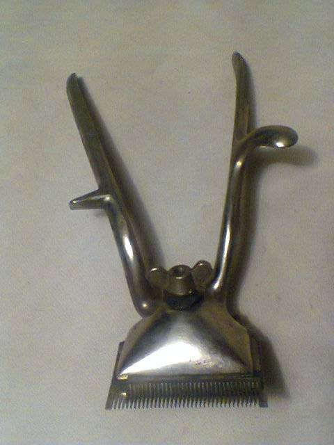 From my Granddad's time A Genuine Boxed "EZEKUT" Hair Clipper set with Directions. In working Order.