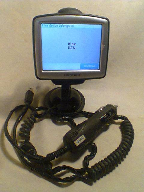 A Tom Tom One with charger + suction mounting Stand. In second hand and in working Condition.