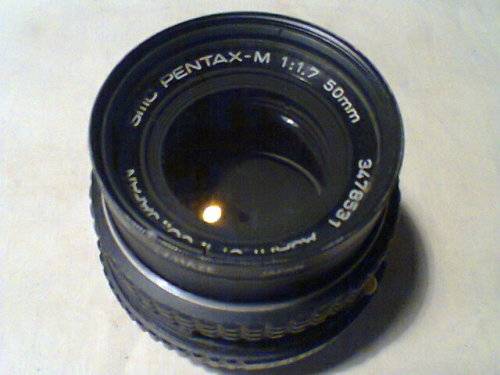 Old Pentax plus it has 3 different lenses to fit it & 2 Flashes.In good used second hand condition.
