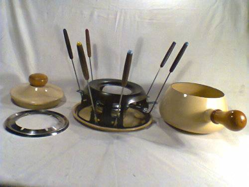 A Almost new/Used complete Enamel "FONDUE set" in Original Box. Ready for U to set out at the party.