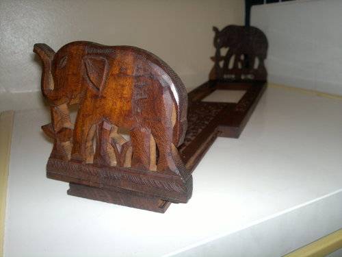 A Ethnic Vintage impressive hard wood Elephant motif adjustable Book Ends. Ideal gift for the Boss.