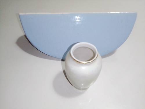 Light Blue Cherub porcelain wall scone and Royal Vermont porcelain Vase.