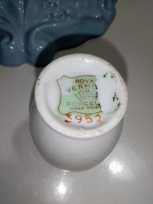 Light Blue Cherub porcelain wall scone and Royal Vermont porcelain Vase.
