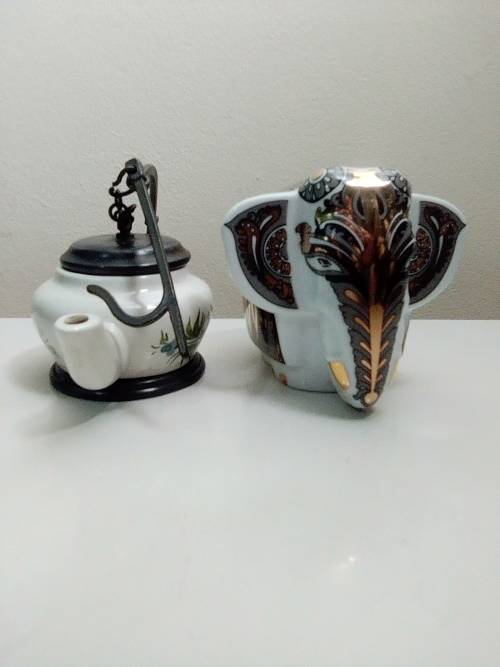 Porcelain/Pewter Kettle/Oil lamp. A True Shi Lankin Memento Elephant 1 sealed pack. The Art of Tea.