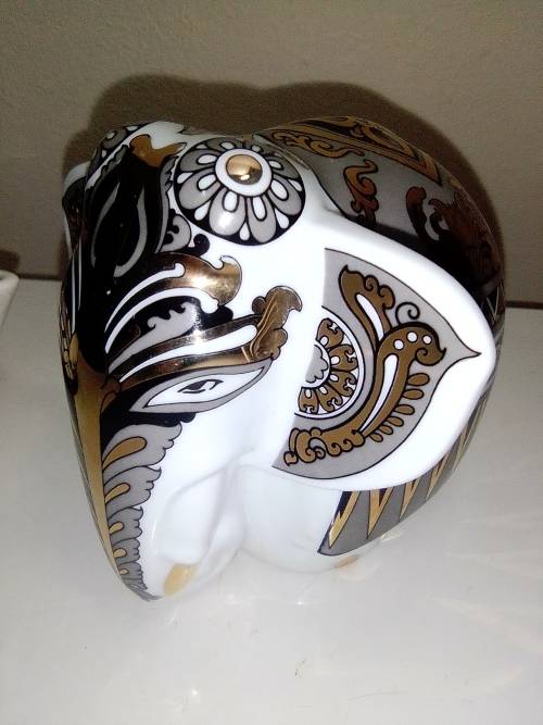 Porcelain/Pewter Kettle/Oil lamp. A True Shi Lankin Memento Elephant 1 sealed pack. The Art of Tea.