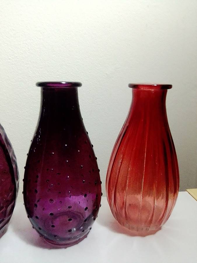 Reserved for "UNDER THE STAIRS" A Vintage collection of 4 Glass vases.