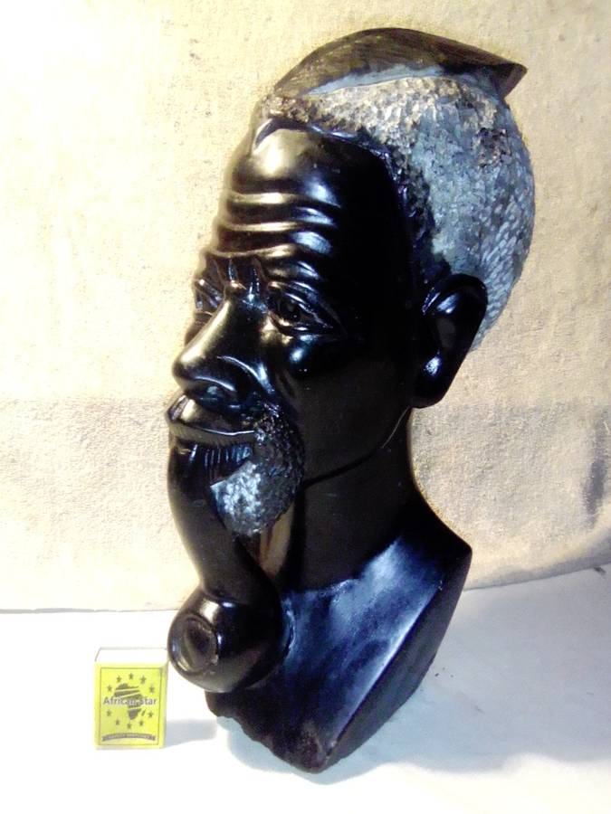 A Mandela and Keyna Busts. African Tribal Head Man stone Bust.  + wooden Drum player statue.