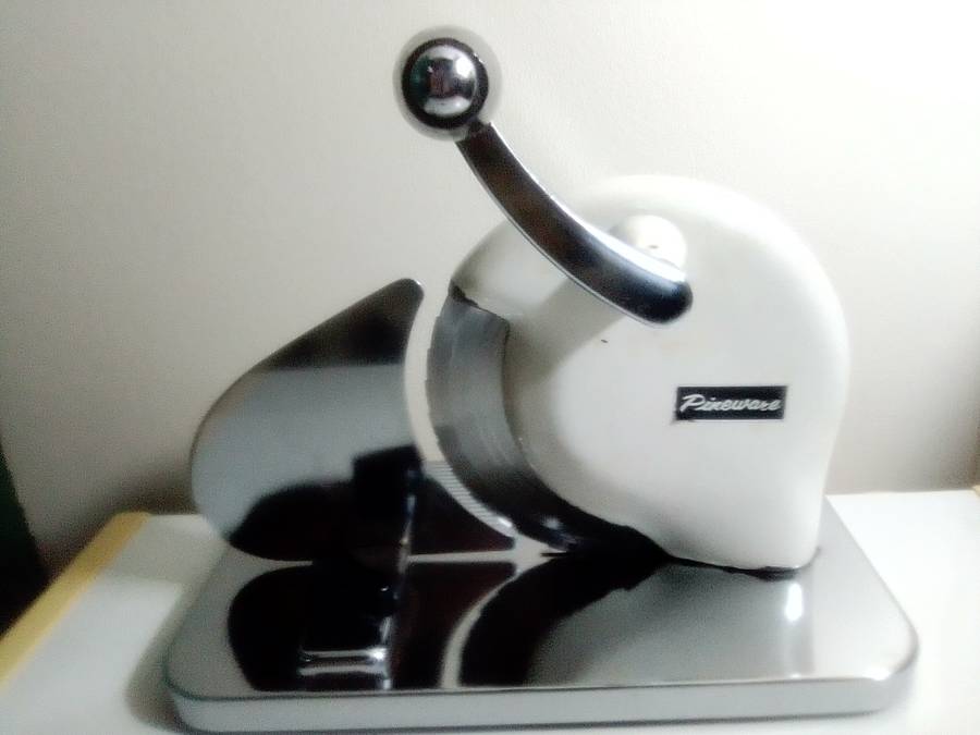 Vintage stainless steel Pineware  bread/meat slicer. For that Retro Kitchen.